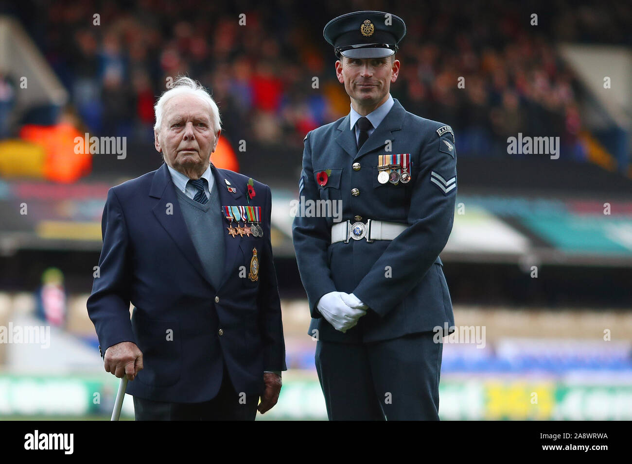 95 year old D-Day veteran, Bernard How and Corporal, Wayne Martin from RAF Honnington ahead of the Remembrance Day fixture.  A season ticket holder at Portman Road for 50 years, he watched his first Town game in 1949, a flight engineer on Stirling bombers and a member of 199 squadron in the RAF, Bernard took part in 35 missions during the Second World War, including D-Day in 1944 - Ipswich Town v Lincoln City, The Emirates FA Cup first round, Portman Road, Ipswich, UK - 9th November 2019  Editorial Use Only - DataCo restrictions apply Stock Photo