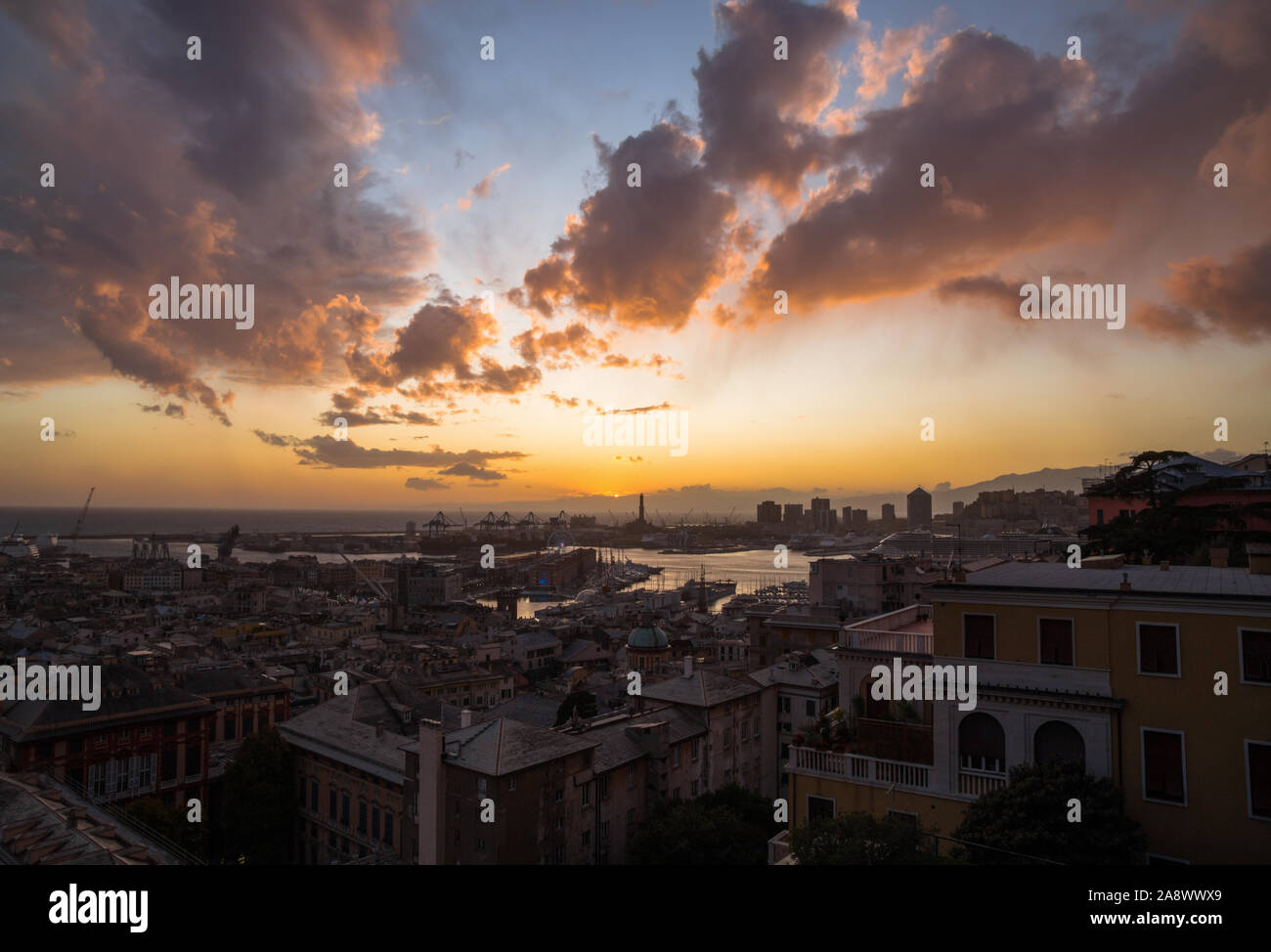 GENOA, ITALY, NOVEMBER  5, 2019 - Aerial view of Genoa, Italy at sunset, the harbor with the hiistoric centre, Italy, Europe Stock Photo