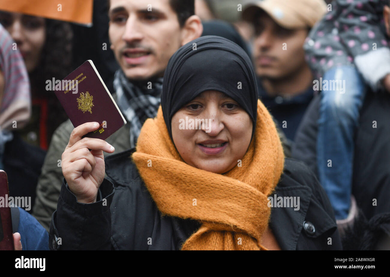 *** STRICTLY NO SALES TO FRENCH MEDIA OR PUBLISHERS *** November 10, 2019 - Paris, France: Thousands of people hold a march against islamophobia two weeks after an attack against a mosque in Bayonne and a rise in anti-Islam scaremongering in the French political class. Protesters hold their passports and national IDs to show they are French. Des milliers de manifestants prennent par a la grande marche contre l'islamophobie. Stock Photo