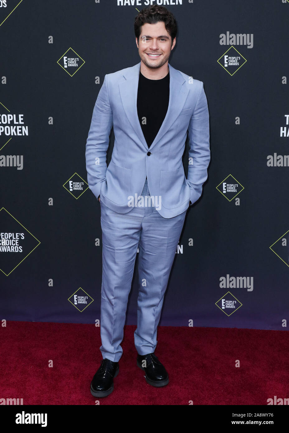 Ben Lewis arrives at the 2019 E! People's Choice Awards held at Barker ...