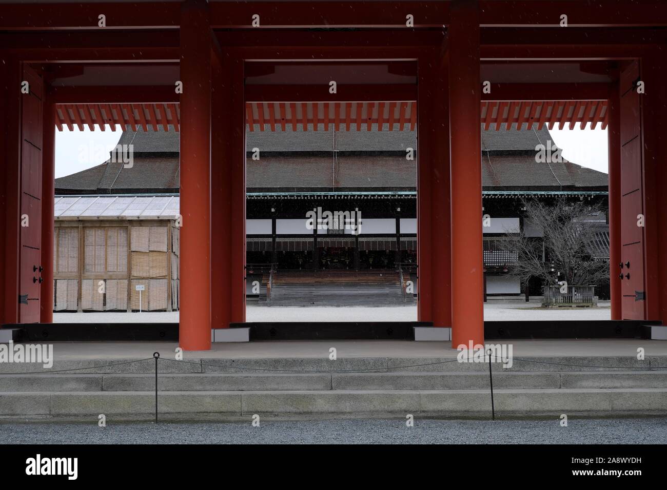 A courtyard of the Kyoto Imperial Palace in winter with temporary enclosure for the Ukon no Tachibana tree Stock Photo