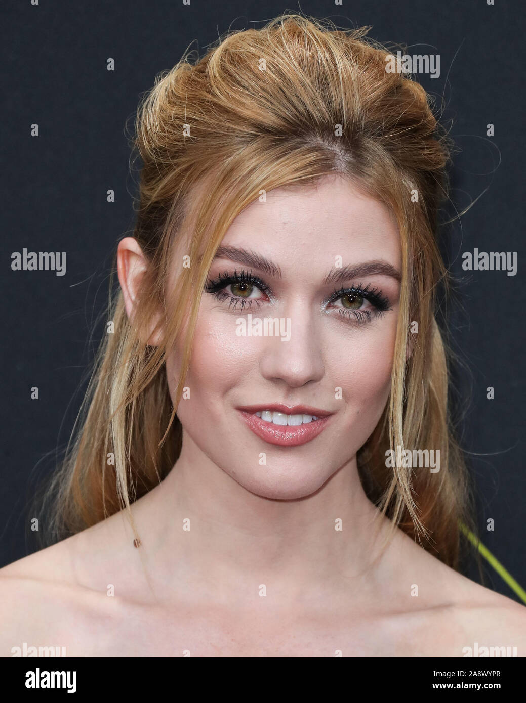 Actress Katherine McNamara wearing Azzaro arrives at the 2019 E! People