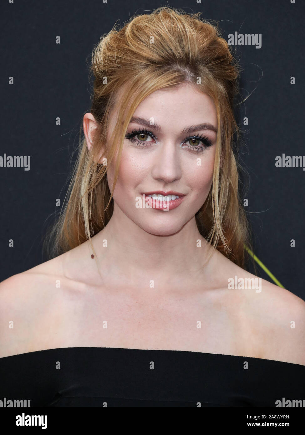 Actress Katherine McNamara wearing Azzaro arrives at the 2019 E! People