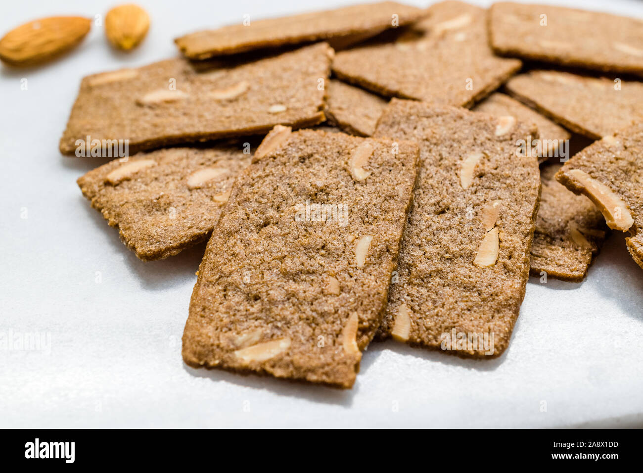 Crispy Almond Thins Cookies / Wafer with Nuts on Marble Board. Organic Snacks Stock Photo Alamy