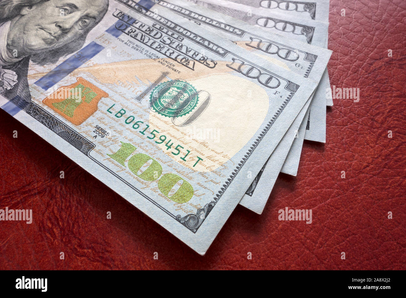 Pile of 100 dollar bills Stock Photo