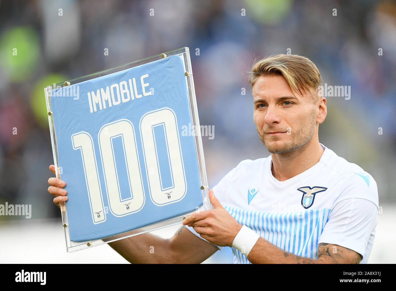 Rome, Italy. 10th Nov, 2019. Ciro Immobile of SS Lazio poses with the award received for 100 goals scored with his team during the Serie A match between Lazio and Lecce at Stadio Olimpico, Rome, Italy on 10 November 2019. Photo by Giuseppe Maffia. Credit: UK Sports Pics Ltd/Alamy Live News Stock Photo