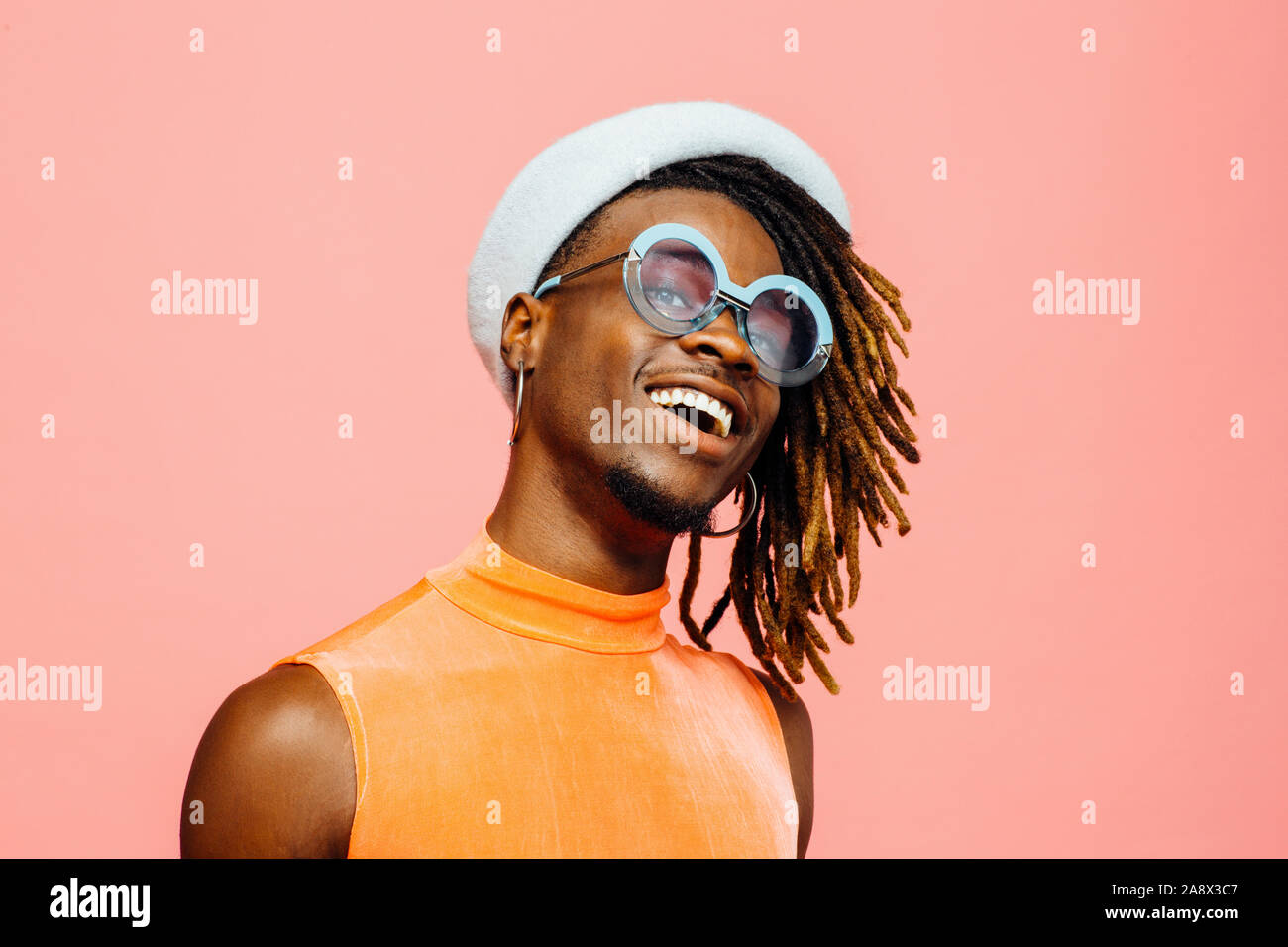 Happy black man shirt cap hi-res stock photography and images - Alamy