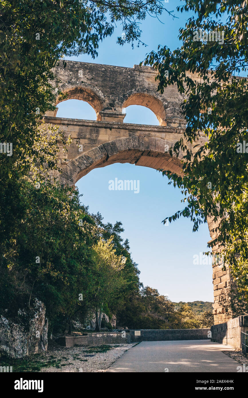 Giant arch arch of the support of the ancient Roman aqueduct Stock