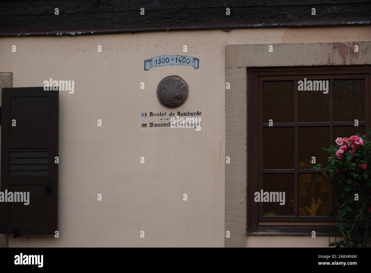 Cannonball from 1300- 1400 Embedded in House Stock Photo