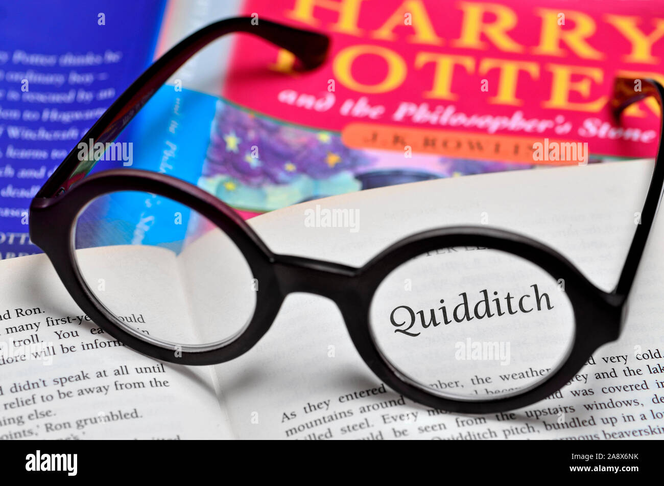 Harry Potter book with Harry Potter glasses Stock Photo