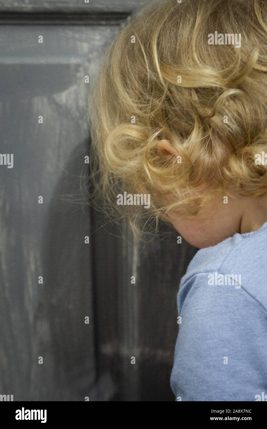 A pretty little girl upset and having a tantrum after being told off, disciplined Stock Photo