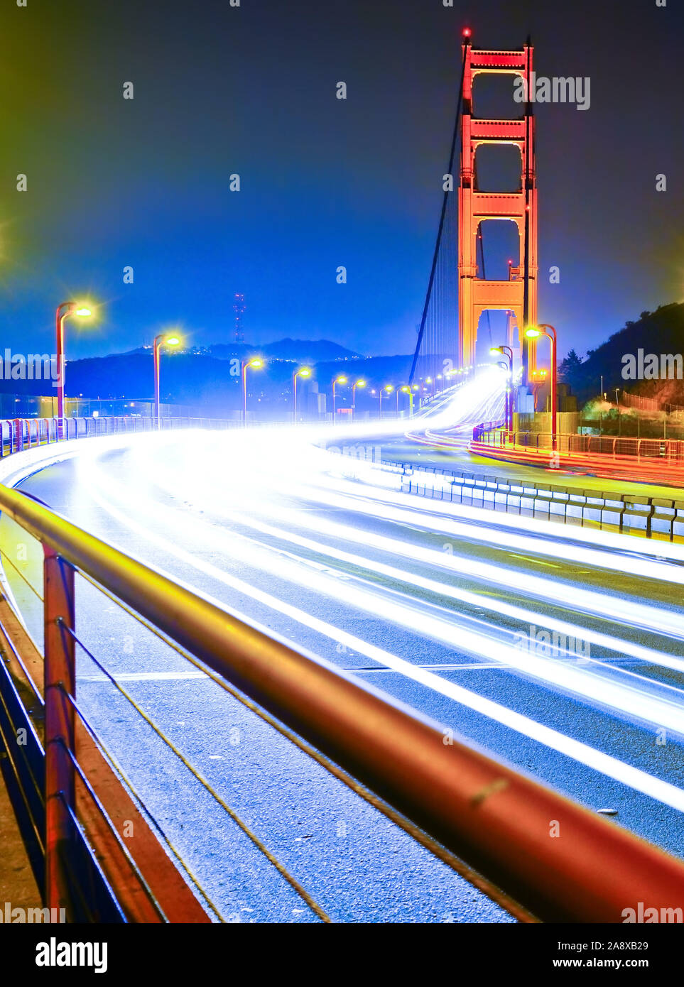 View of Golden Gate Bridge with lots of cars passing through in San ...