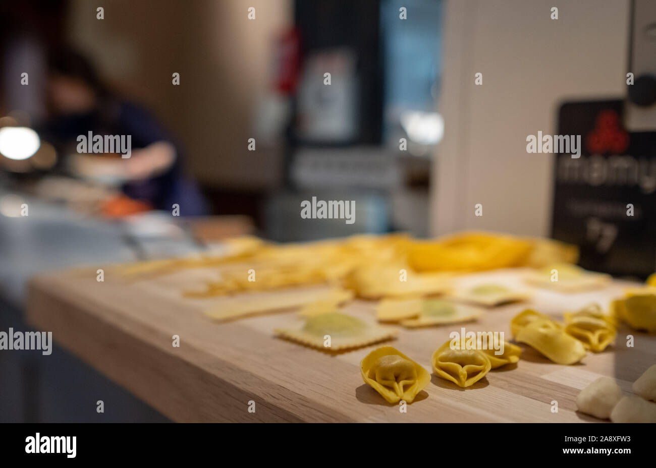 Close up of freshly made ravioli pasta at food counter at Mercato Mayfair, food market in restored St Mark's Church in Mayfair London UK. Stock Photo