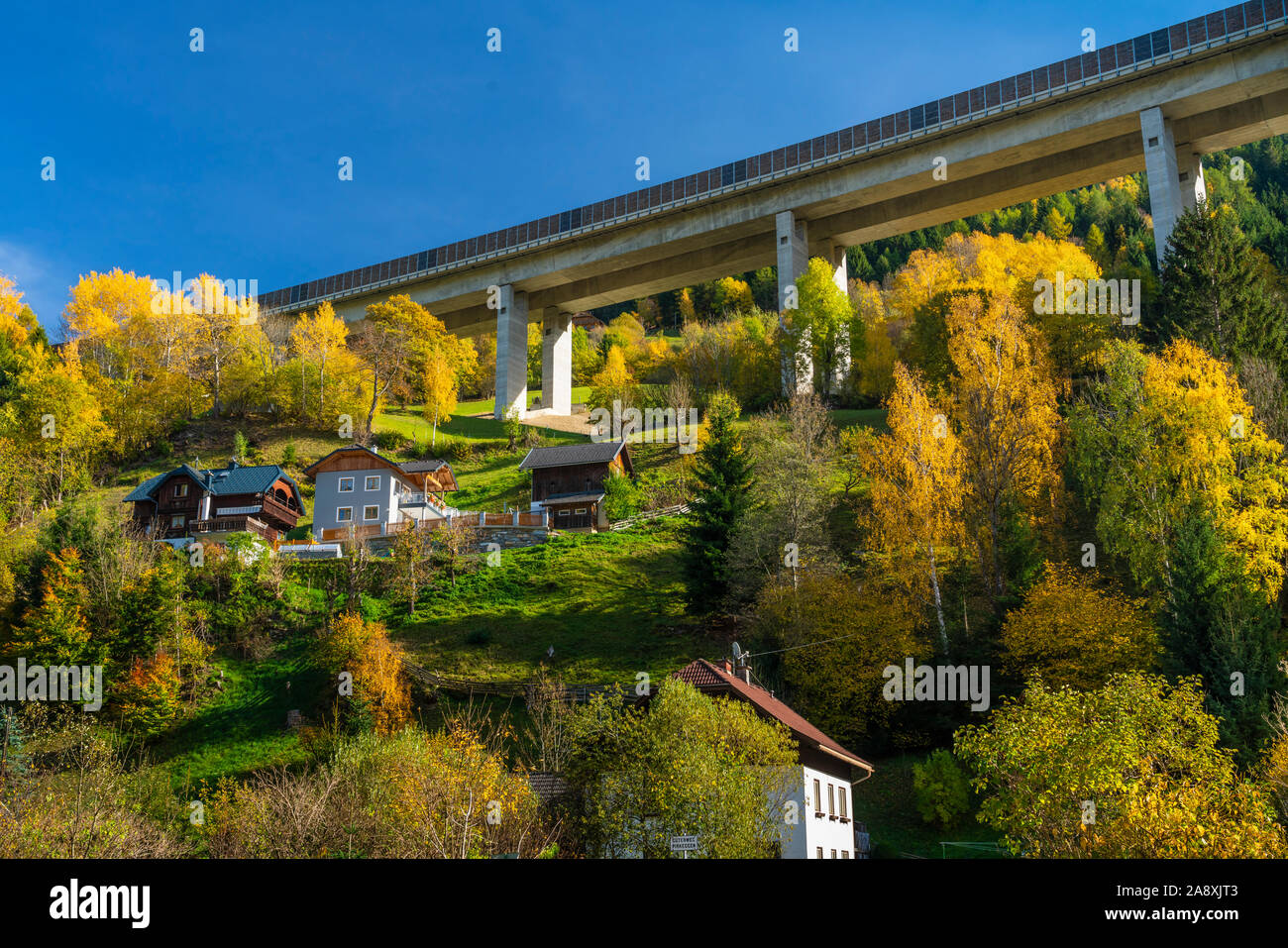 The raised Autobahn freeway over the village of Spittal, Austria, Europe. Stock Photo