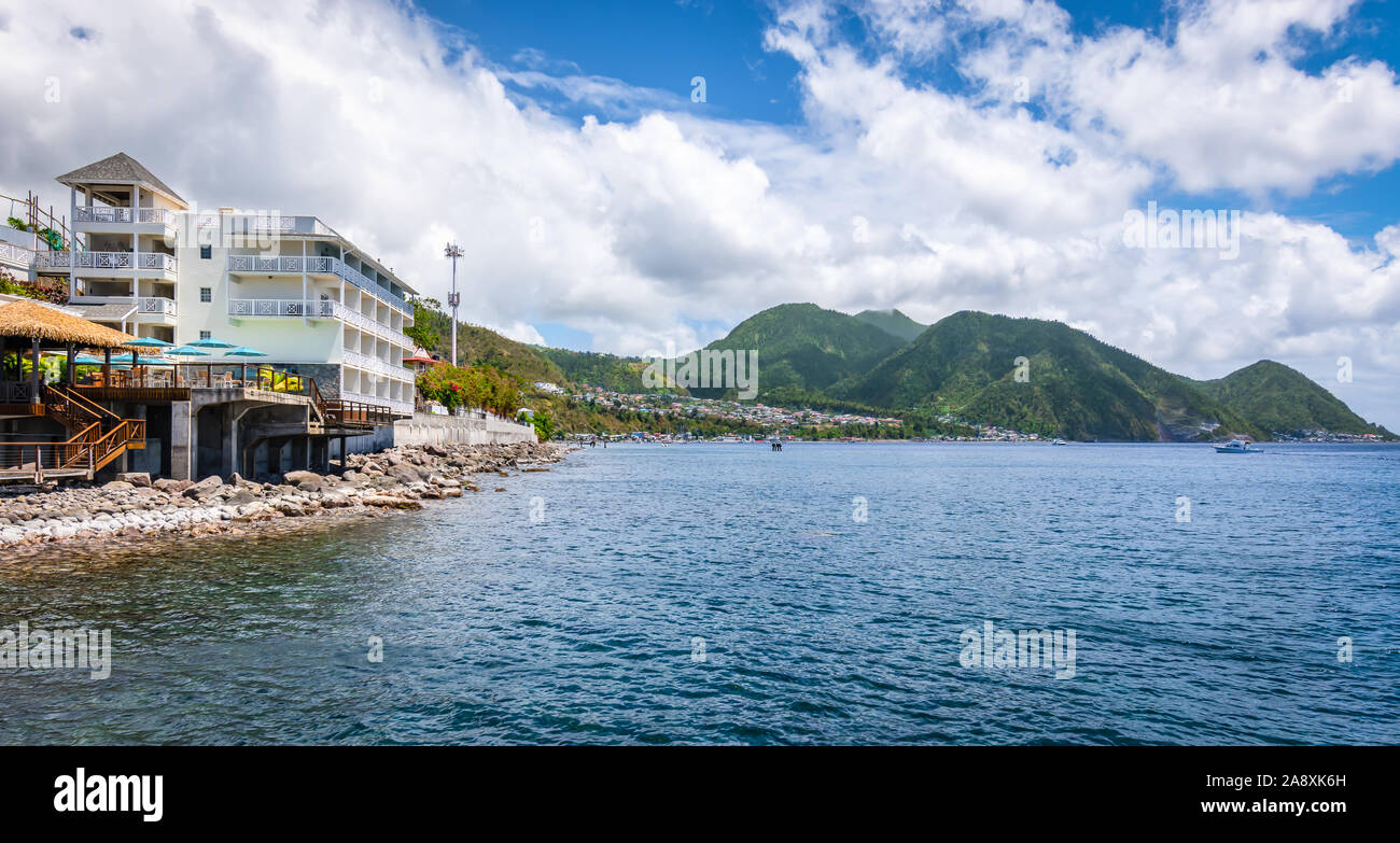 Landscape with coastline at the port of Roseau in Dominica. Stock Photo