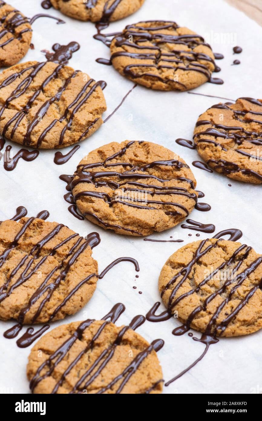 Homemade ginger biscuits with chocolate drizzle Stock Photo