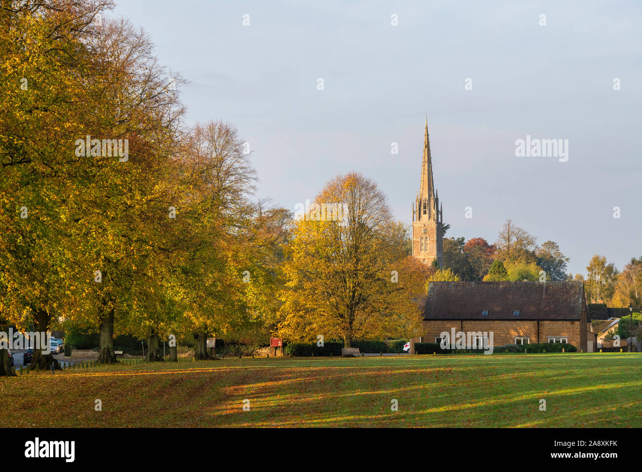 Kings Sutton park and church in the autumn. Kings Sutton ...