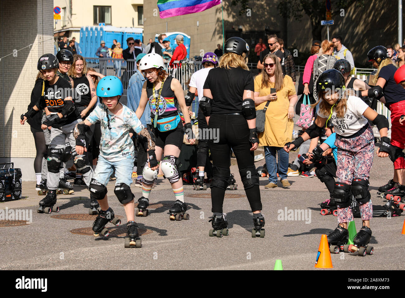 Free roller skating lessons at Kallio Block Party community event in Helsinki, Finland Stock Photo