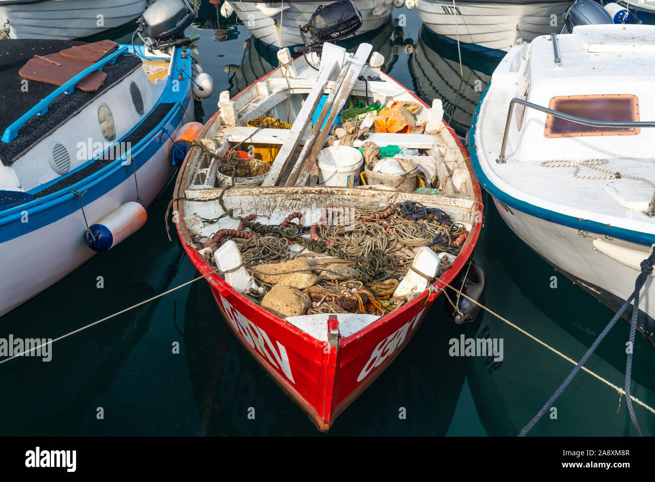 A closeup of a fishing boat loaded with gear at Rovinj, Croatia, Istria. Stock Photo
