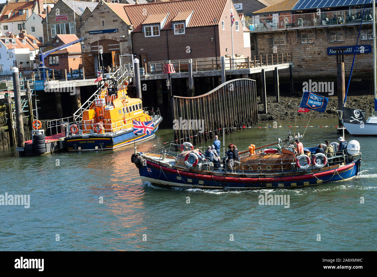 The Former Whitby RNLI Lifeboat Mary Ann Hepworth with Passengers on a Boat Trip in the River Esk at Whitby North Yorkshire England United Kingdom Stock Photo