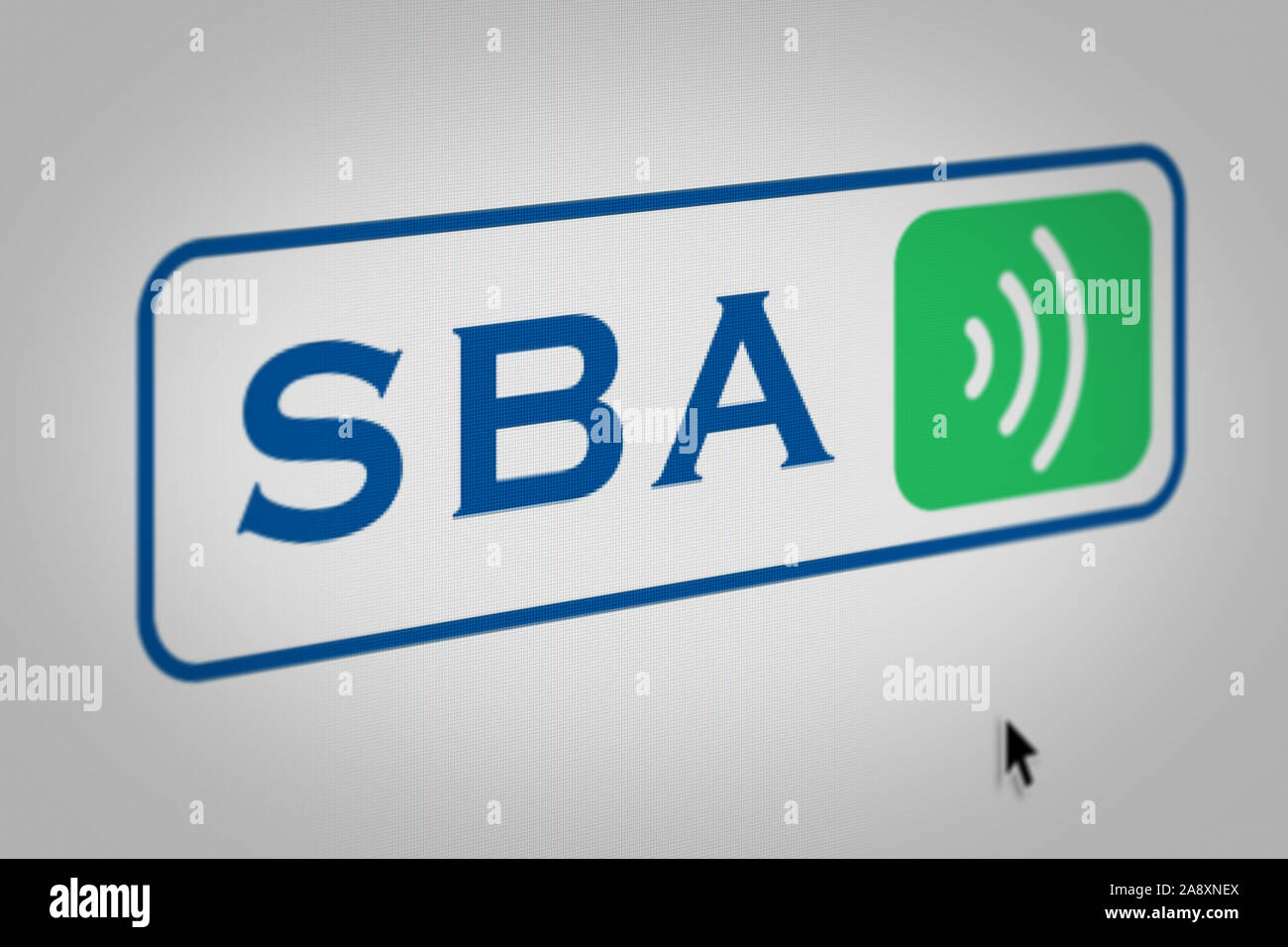 Logo of the public company SBA Communications displayed on a computer screen in close-up. Credit: PIXDUCE Stock Photo