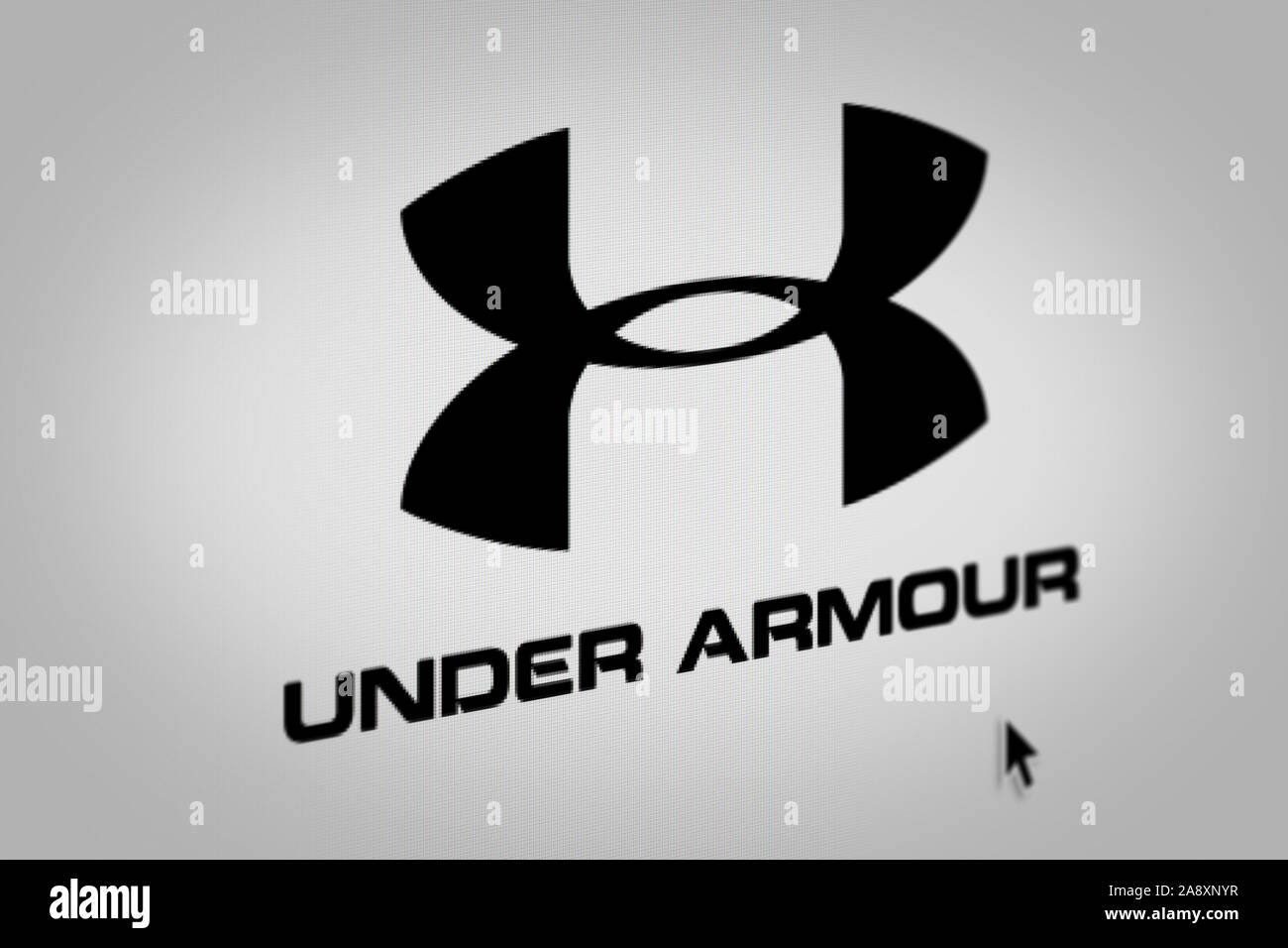 Logo of public company Under Armour displayed on a smartphone. Negative  stock market background. Credit: PIXDUCE Stock Photo - Alamy