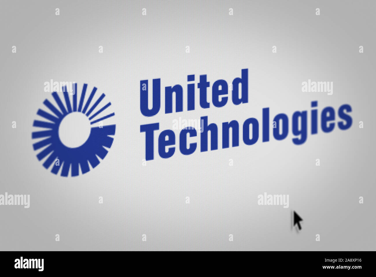 Logo of the public company United Technologies displayed on a computer screen in close-up. Credit: PIXDUCE Stock Photo