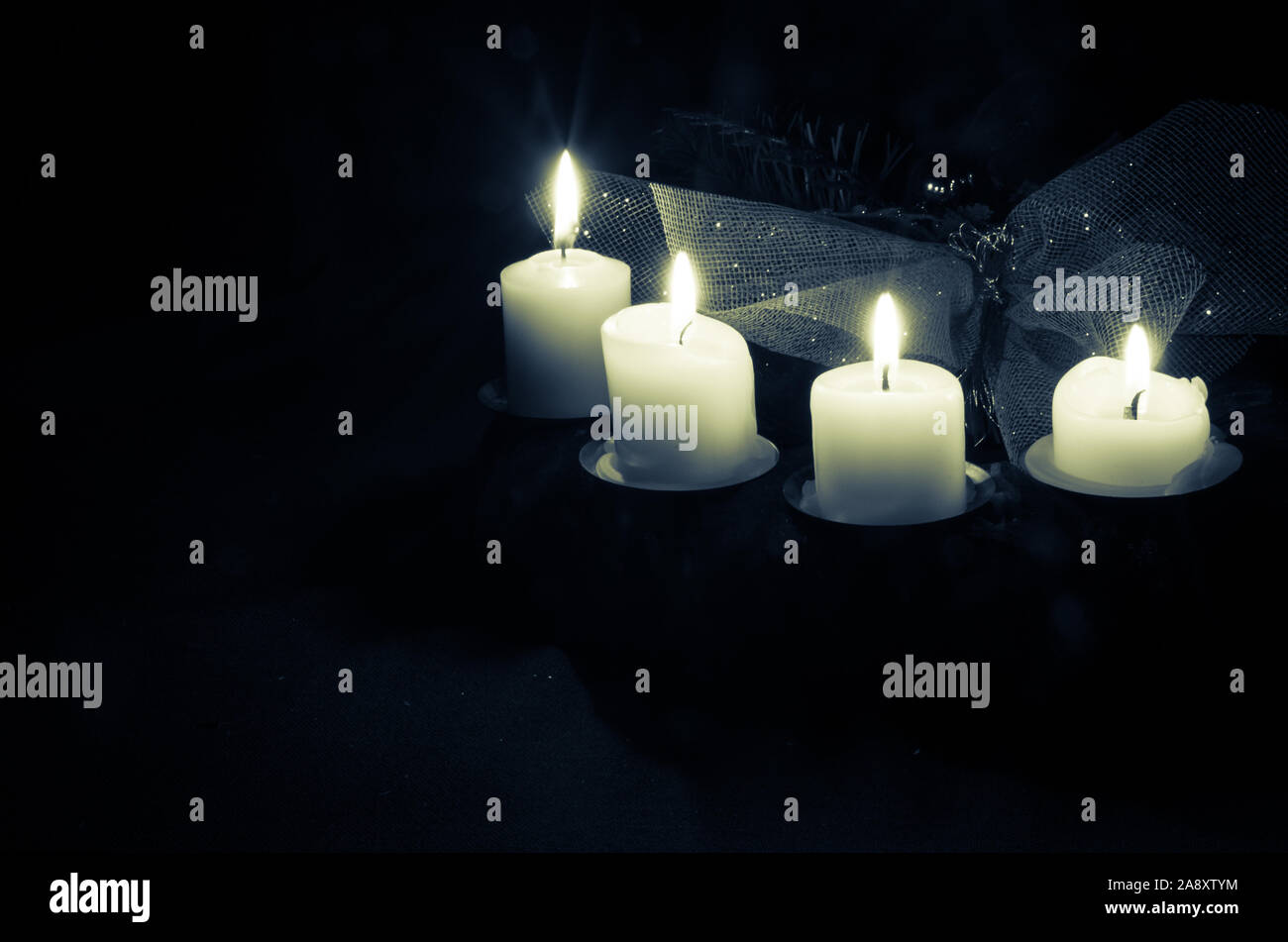 advent wreath with four burning candles Stock Photo Alamy
