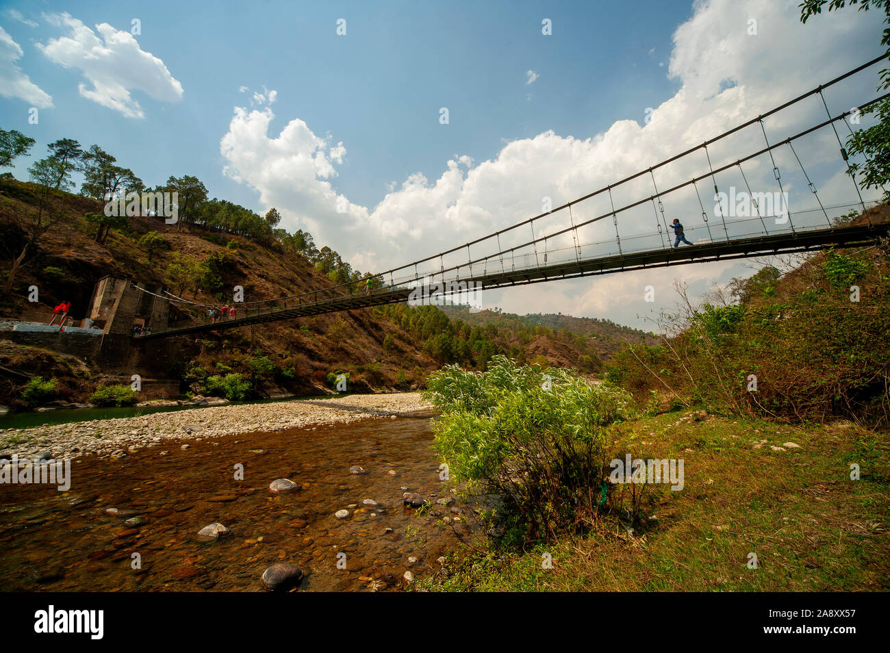 Suspension bridge over the Kosi river, Uttarakhand, India Stock Photo