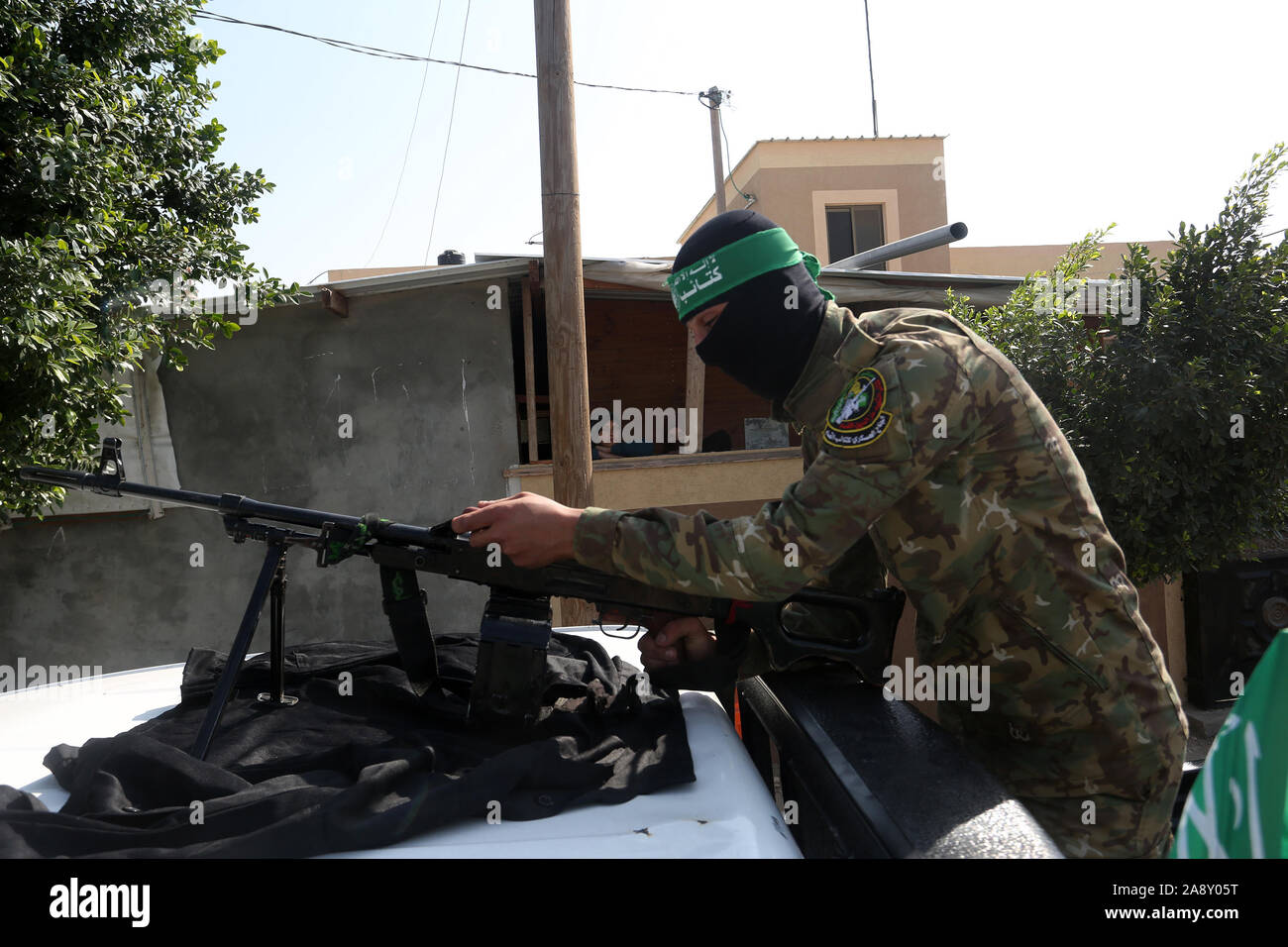 Palestinian Hamas militants take part in an anti-Israel military show in the southern Gaza Strip on Nov 11, 2019. Photo by Abed Rahim Khatib/alamy Stock Photo