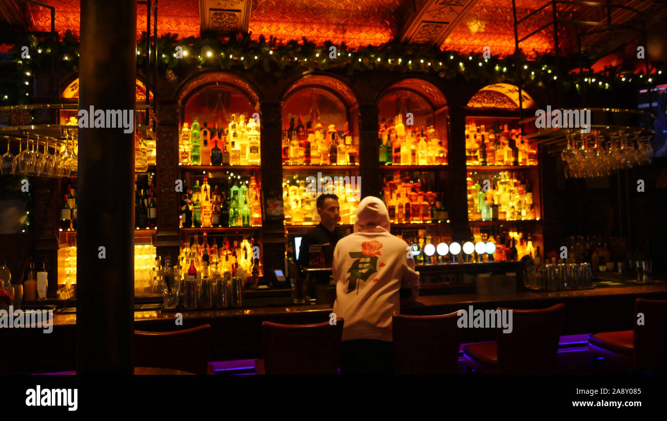 Typical bar in Galway Ireland bartender Stock Photo Alamy