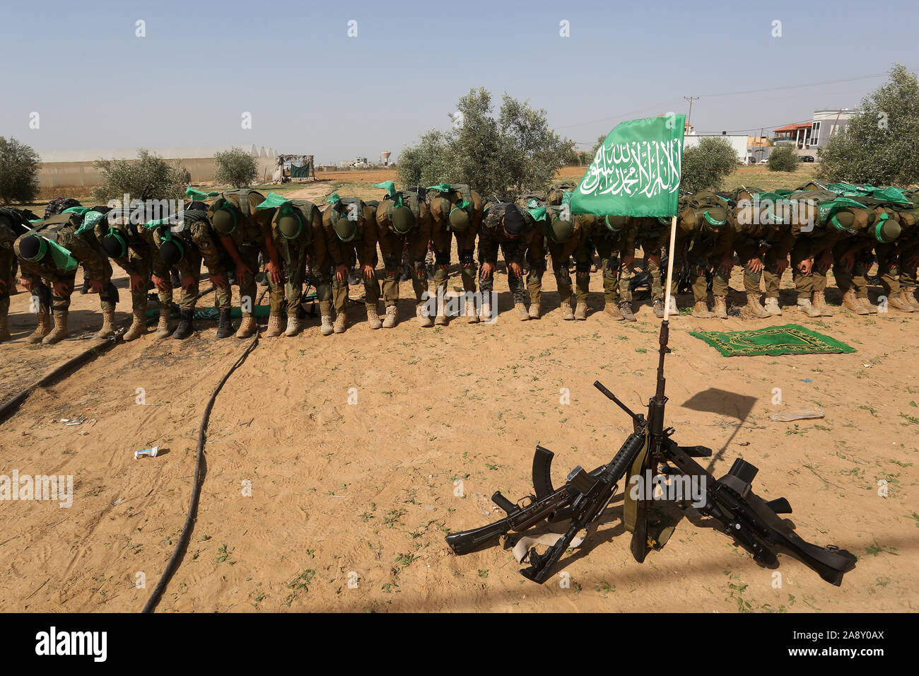 Palestinian Hamas militants take part in an anti-Israel military show in the southern Gaza Strip on Nov 11, 2019. Photo by Abed Rahim Khatib/alamy Stock Photo