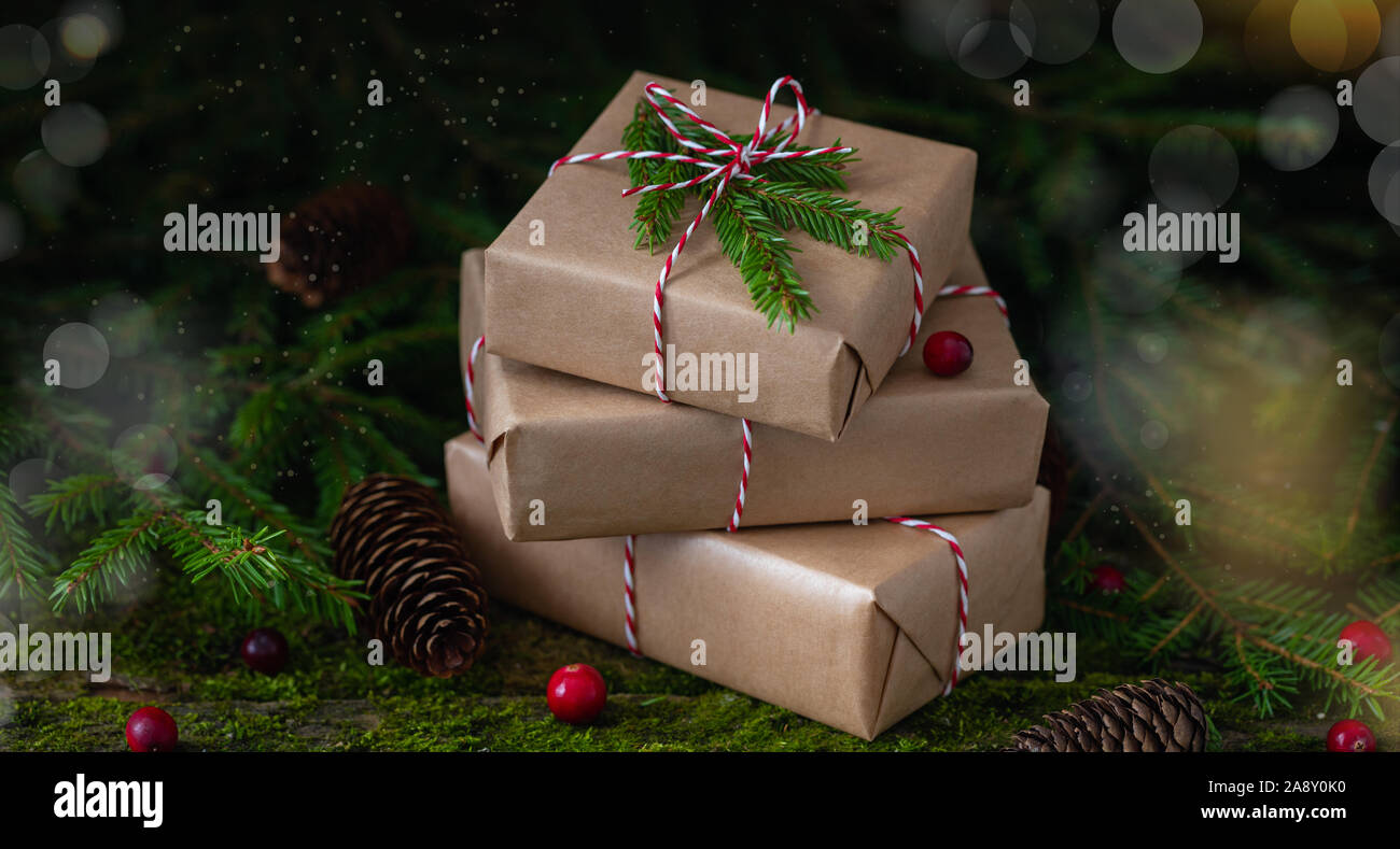New Year Christmas composition with a pile of presents wrapped in craft ...