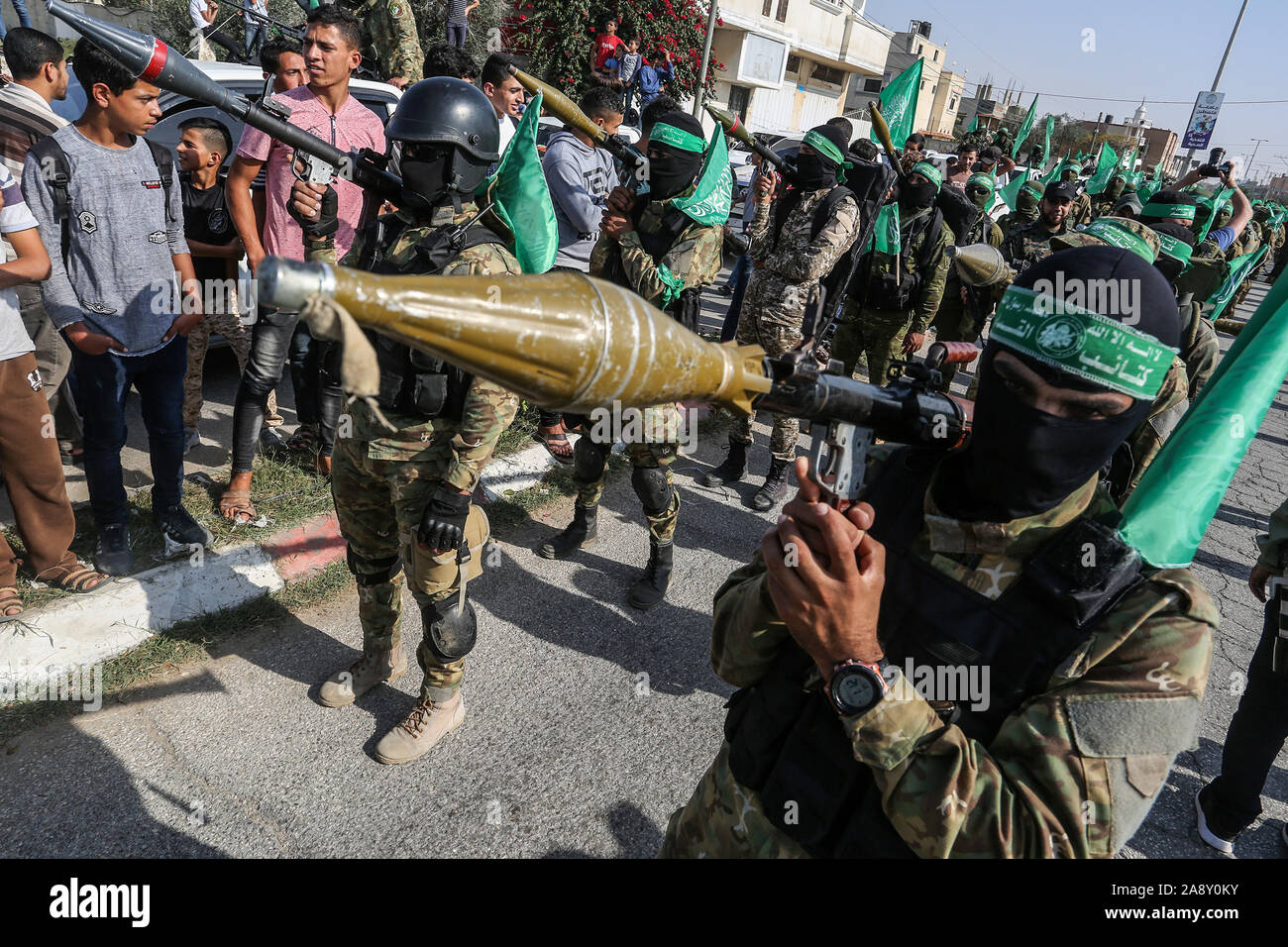 Palestinian Hamas militants take part in an anti-Israel military show in the southern Gaza Strip on Nov 11, 2019. Photo by Abed Rahim Khatib/alamy Stock Photo