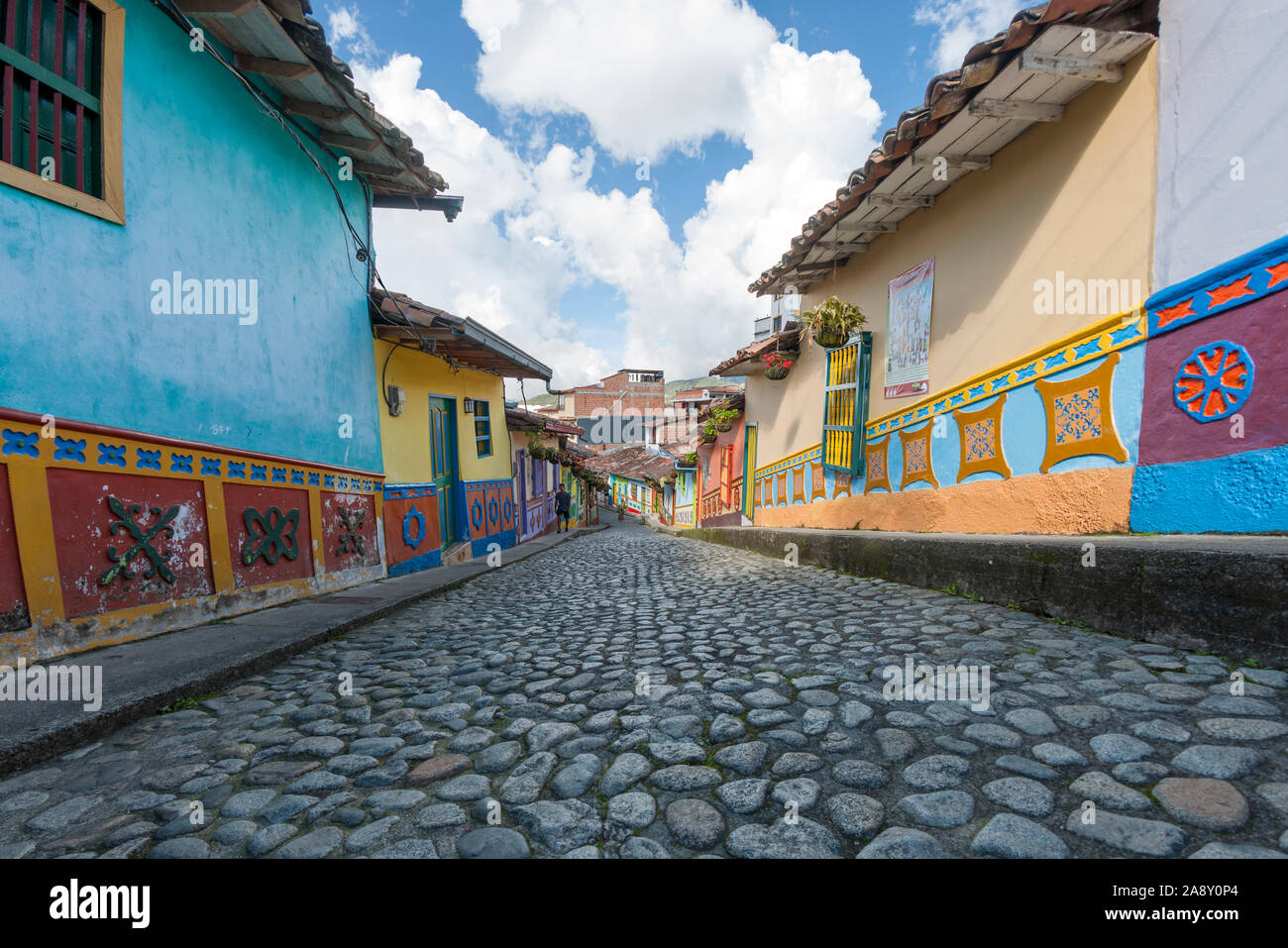 Colourful houses and cobblestone street in the town of Guatapé, Colombia. Stock Photo