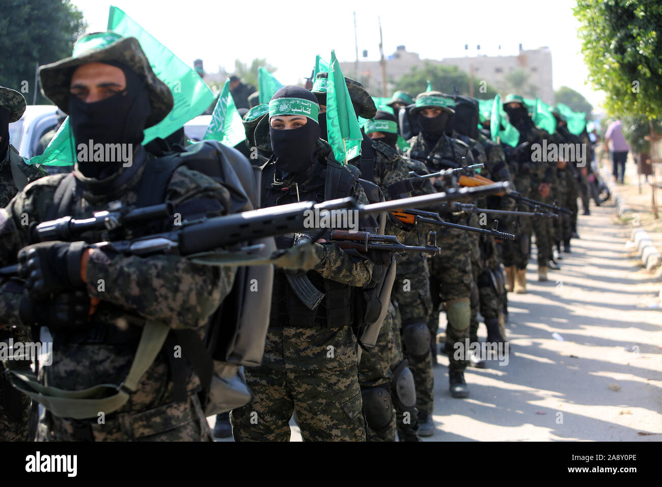 Palestinian Hamas militants take part in an anti-Israel military show in the southern Gaza Strip on Nov 11, 2019. Photo by Abed Rahim Khatib/alamy Stock Photo