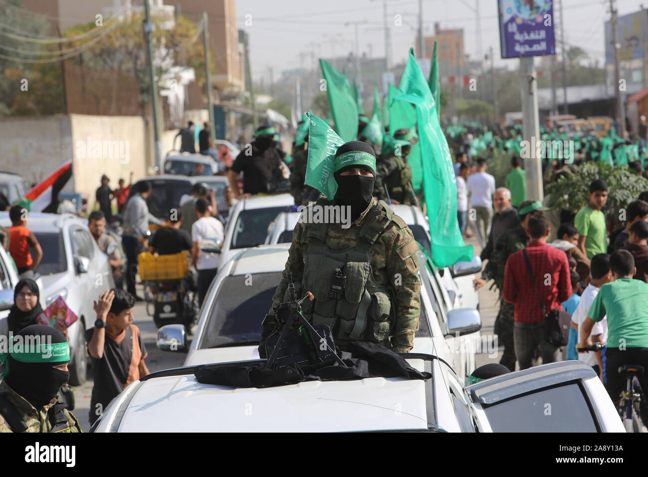 Palestinian Hamas militants take part in an anti-Israel military show in the southern Gaza Strip on Nov 11, 2019. Photo by Abed Rahim Khatib/alamy Stock Photo