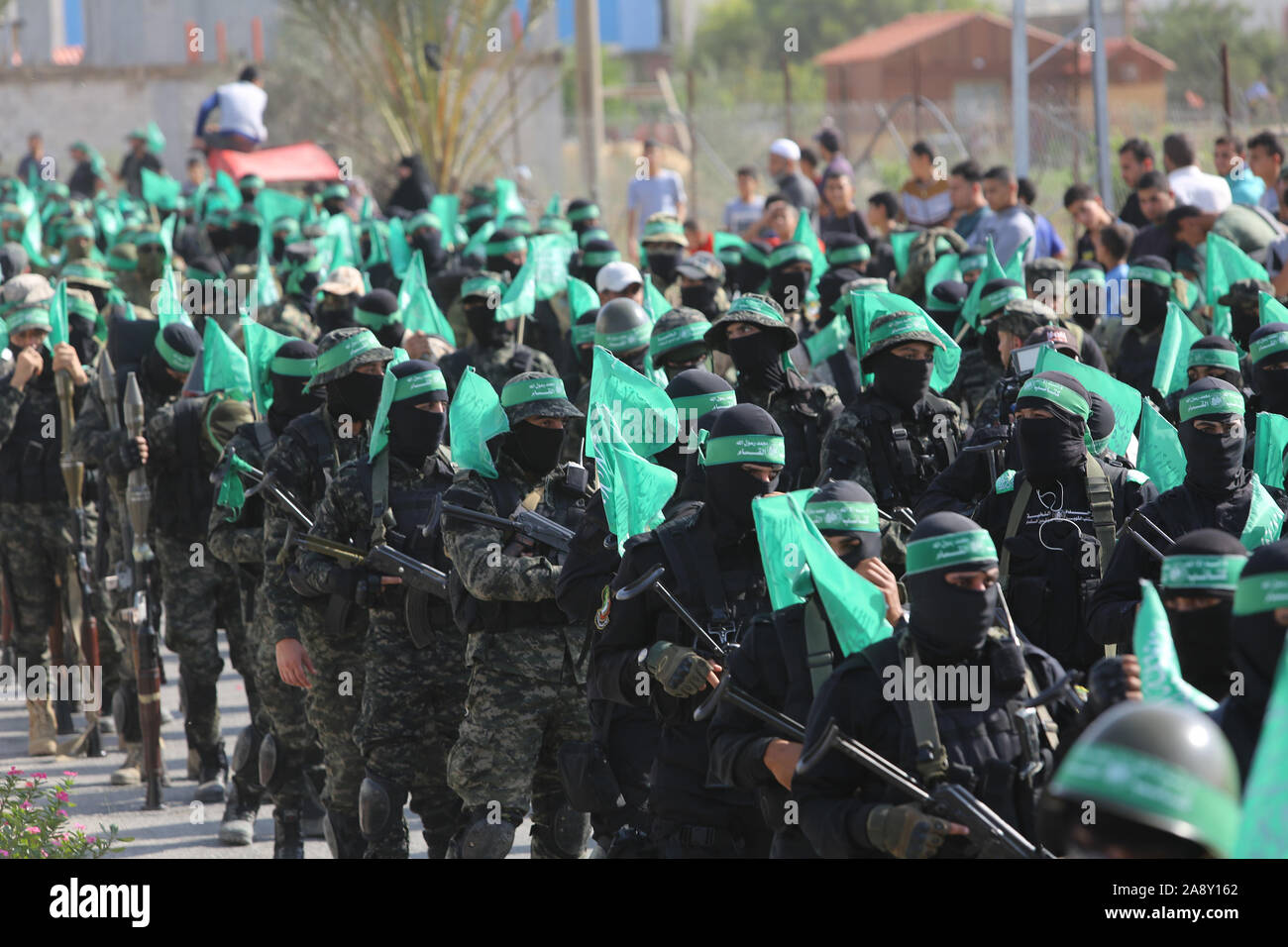 Palestinian Hamas militants take part in an anti-Israel military show in the southern Gaza Strip on Nov 11, 2019. Photo by Abed Rahim Khatib/alamy Stock Photo