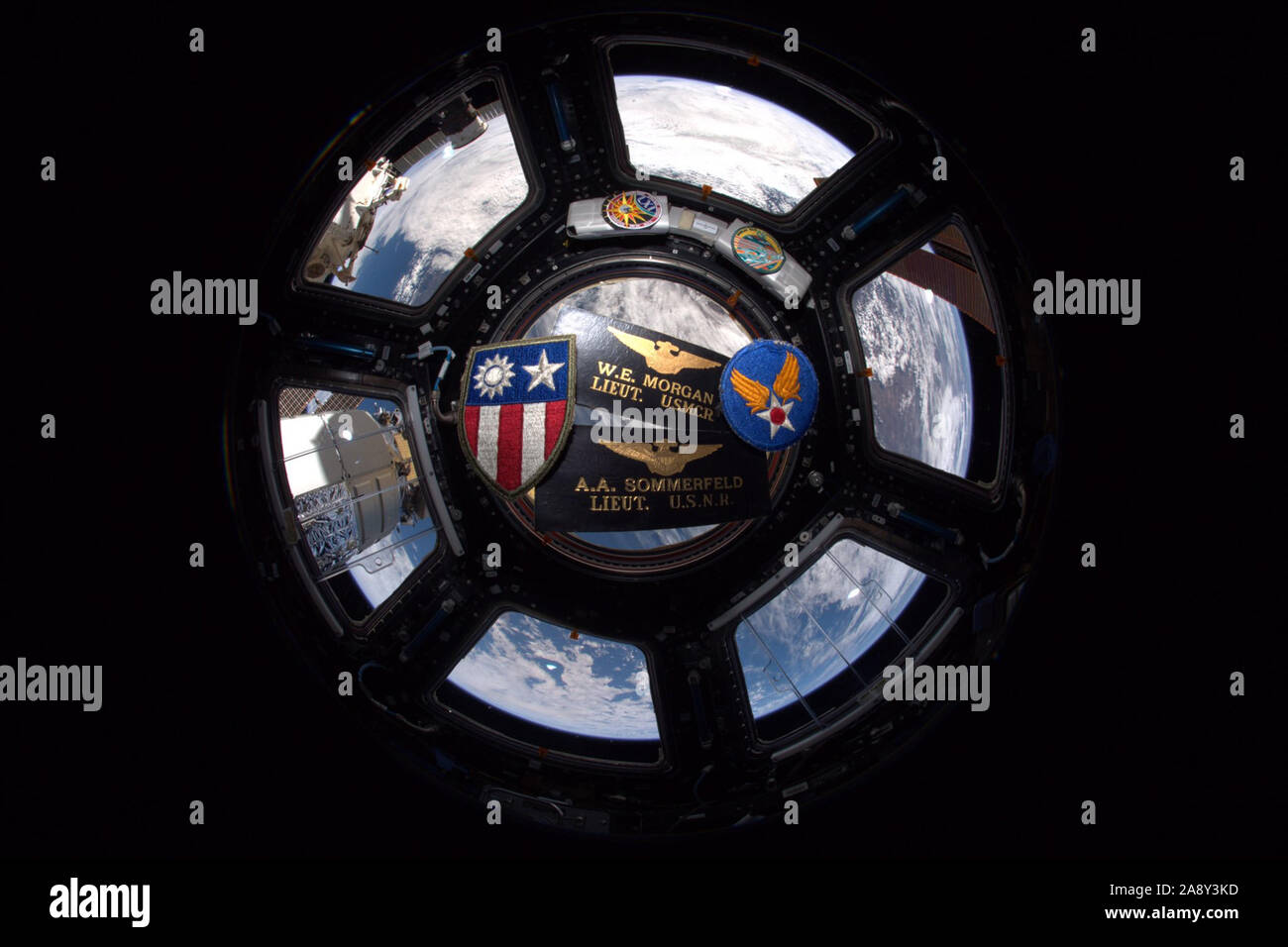 International Space Station. 11th Nov 2019. On November 11, 2019, astronaut Andrew Morgan shared this photograph and Veterans Day message from the International Space Station. Morgan wrote, 'It's a privilege to honor our nation's veterans today. My own family's military service extends through multiple generations, representing every branch. I honor all vets by bringing reminders of my family's military legacy to space with me. Credit: UPI/Alamy Live News Stock Photo