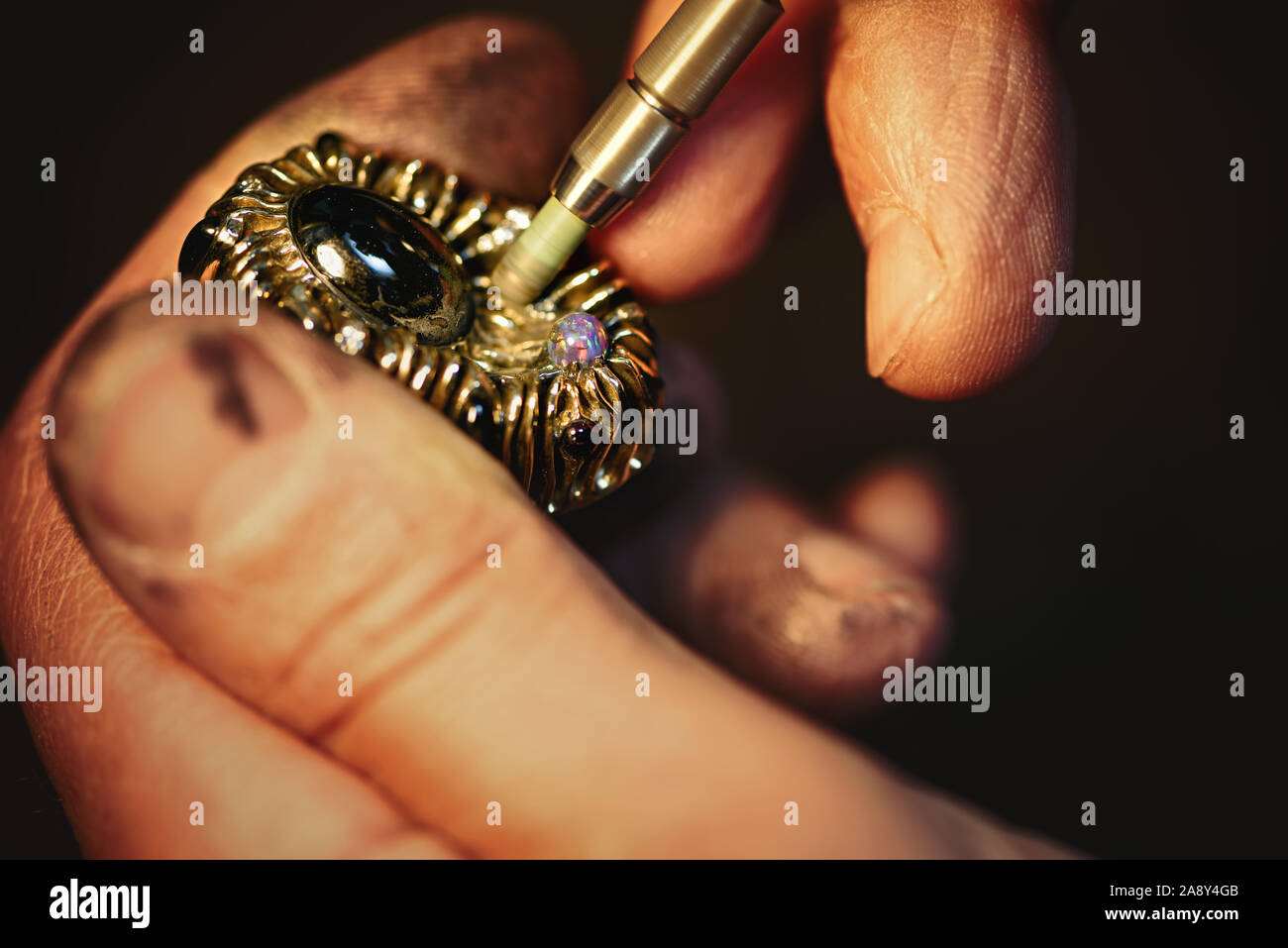 Polishing precious stones hires stock photography and images Alamy