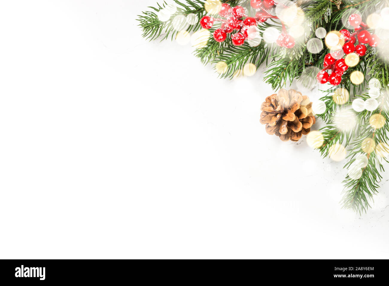 Christmas background with fir tree and decorations on white Stock Photo ...