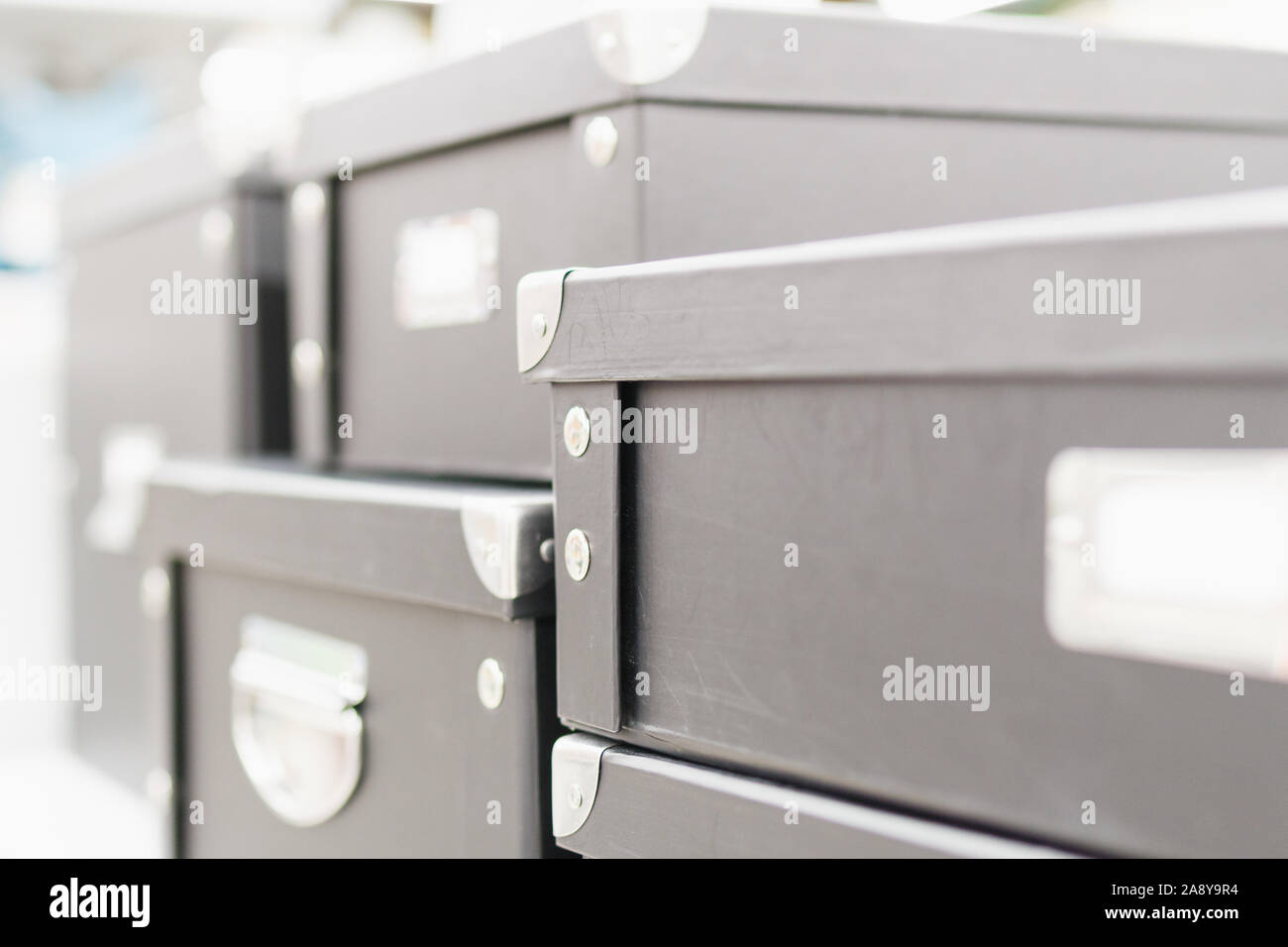 Storage box with lids and metal corners. Closeup view, storage concept