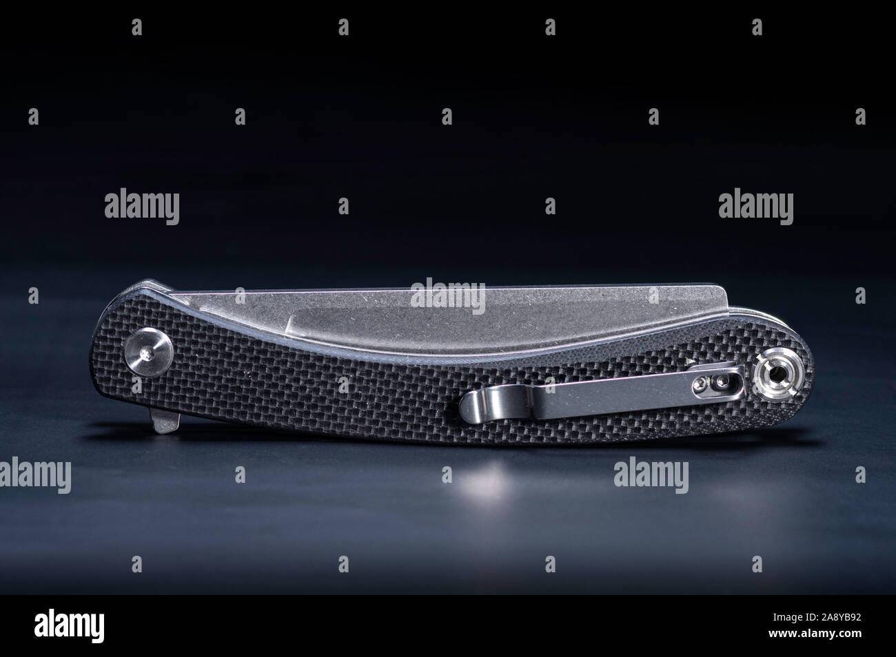 Folding pocket knife with a clip. The knife is clipped in the folded