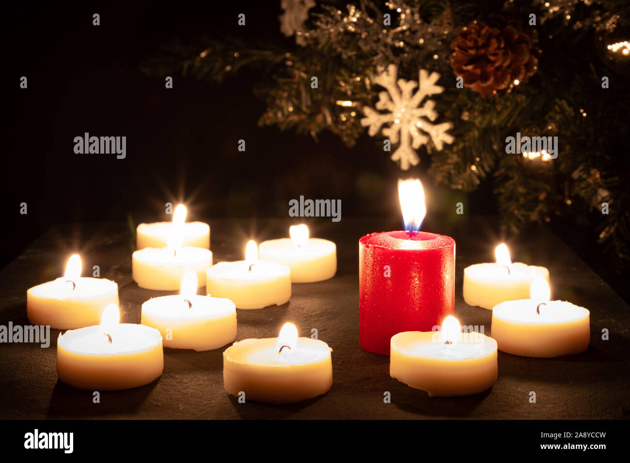 Christmas candles burning at night Stock Photo Alamy