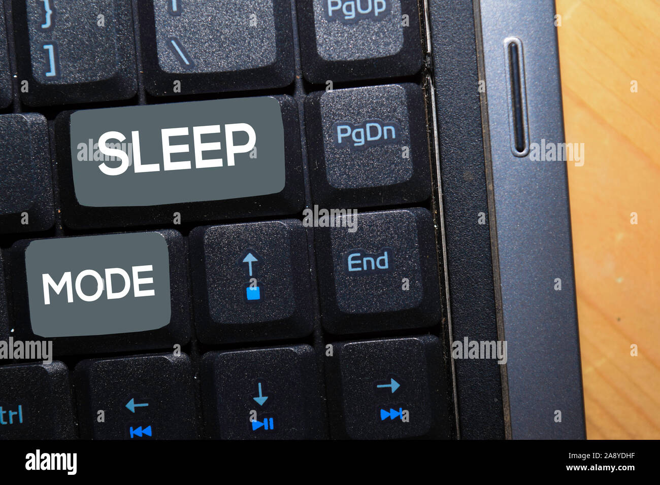 Sleep Mode write on keyboard isolated on laptop background Stock Photo