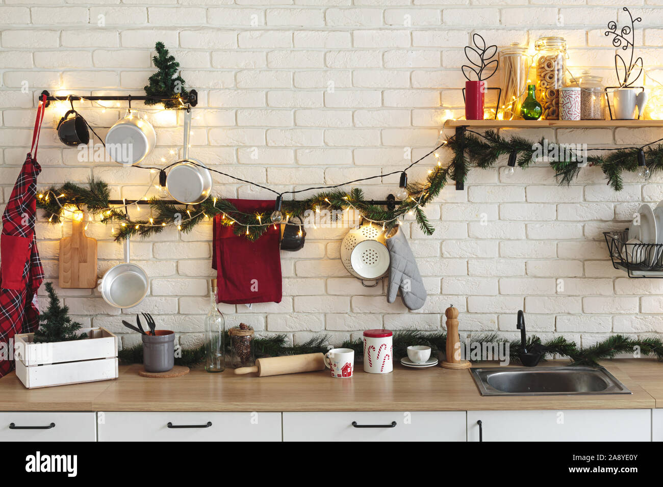 Interior White Kitchen And Red Christmas And New Year Decorations