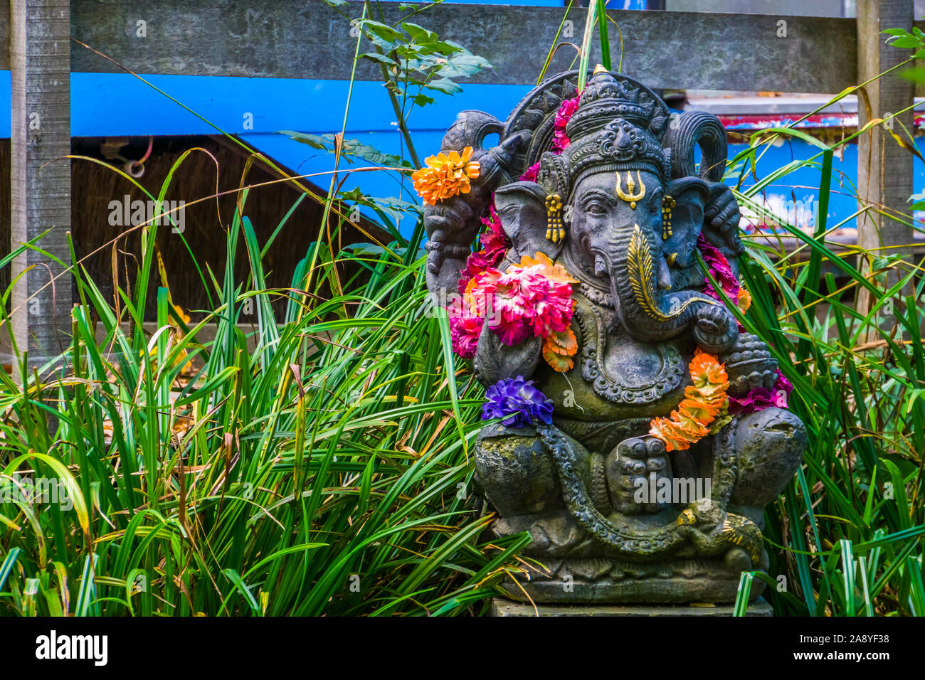 beautiful Ganesha sculpture, Indian elephant god, spiritual garden decorations Stock Photo