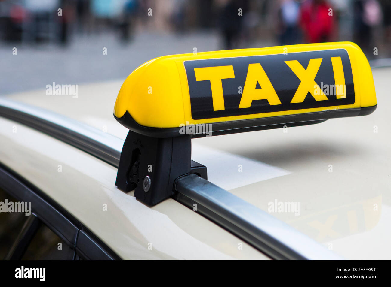 A close-up of a Taxi sign. Stock Photo