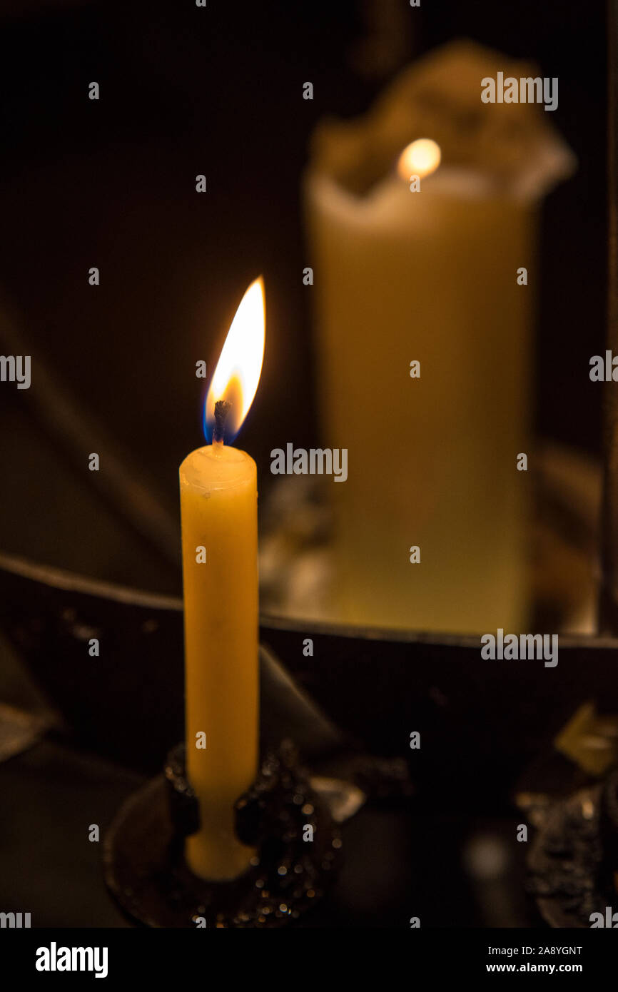 Close-up of an illuminated candle. Stock Photo