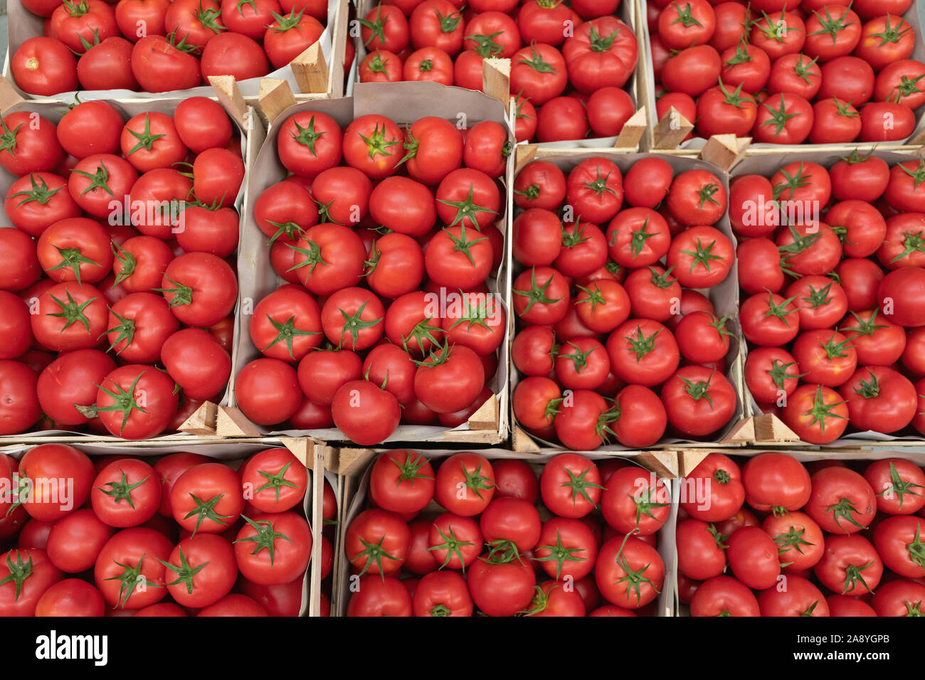 Tomatoes in crates hi-res stock photography and images - Alamy
